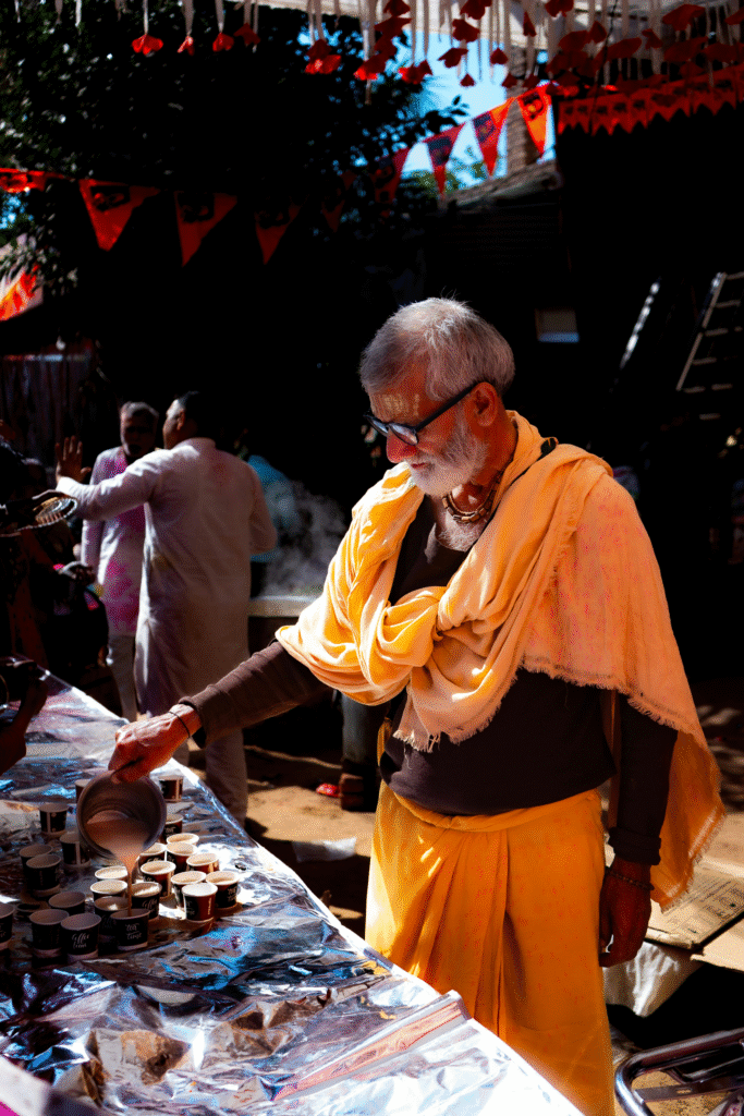 Tea vendor pouring tea for tourists